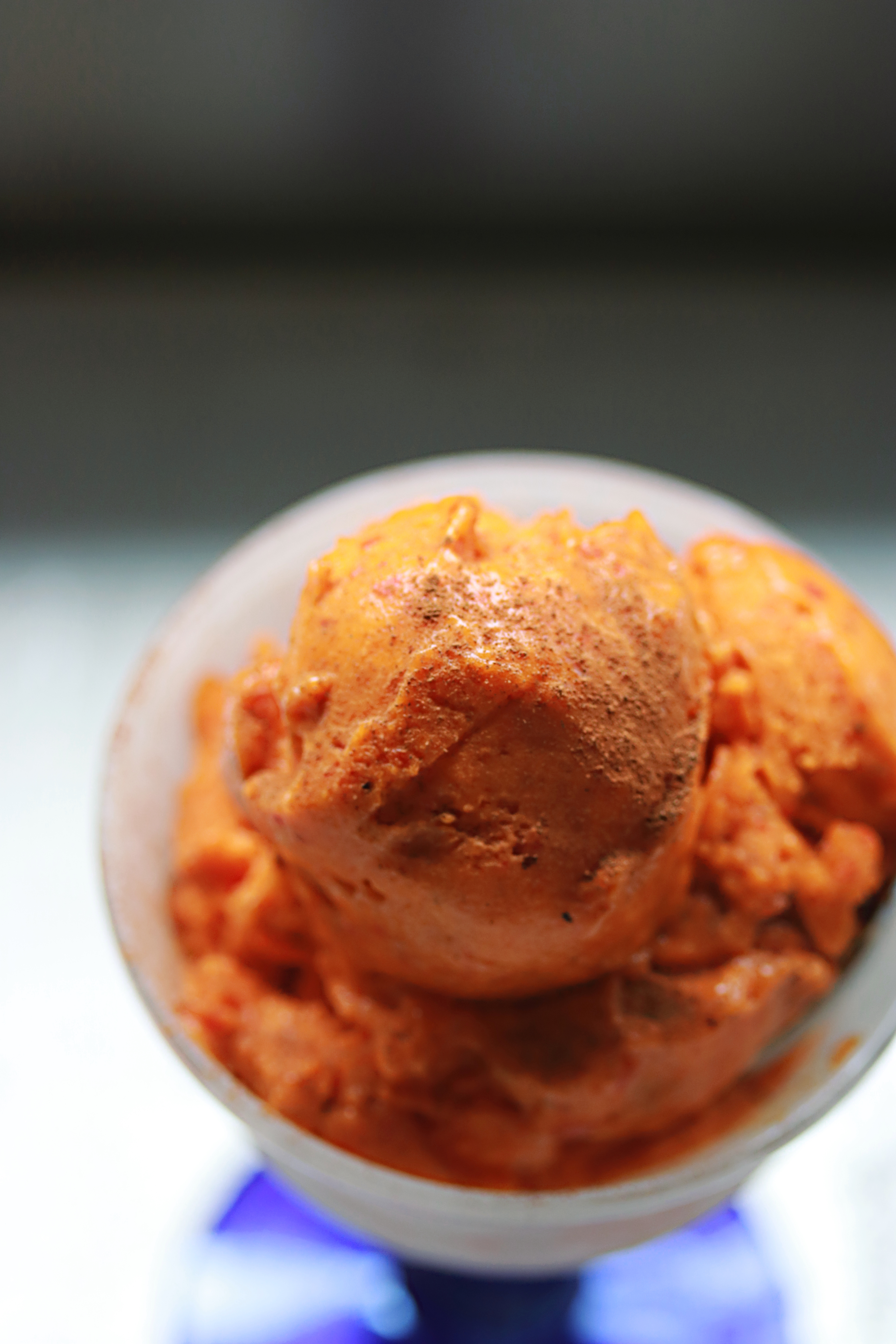 Three ingredient vegan sorbet with persimmons! This 100% guilt free vegan sorbet honestly tastes like pumpkin pie and doesn't have the extra calories!Three ingredient vegan sorbet! You'll never guess what gives this 100% guilt free vegan sorbet its vibrant orange color. It tastes like pumpkin pie, but there is no pumpkin in the recipe!