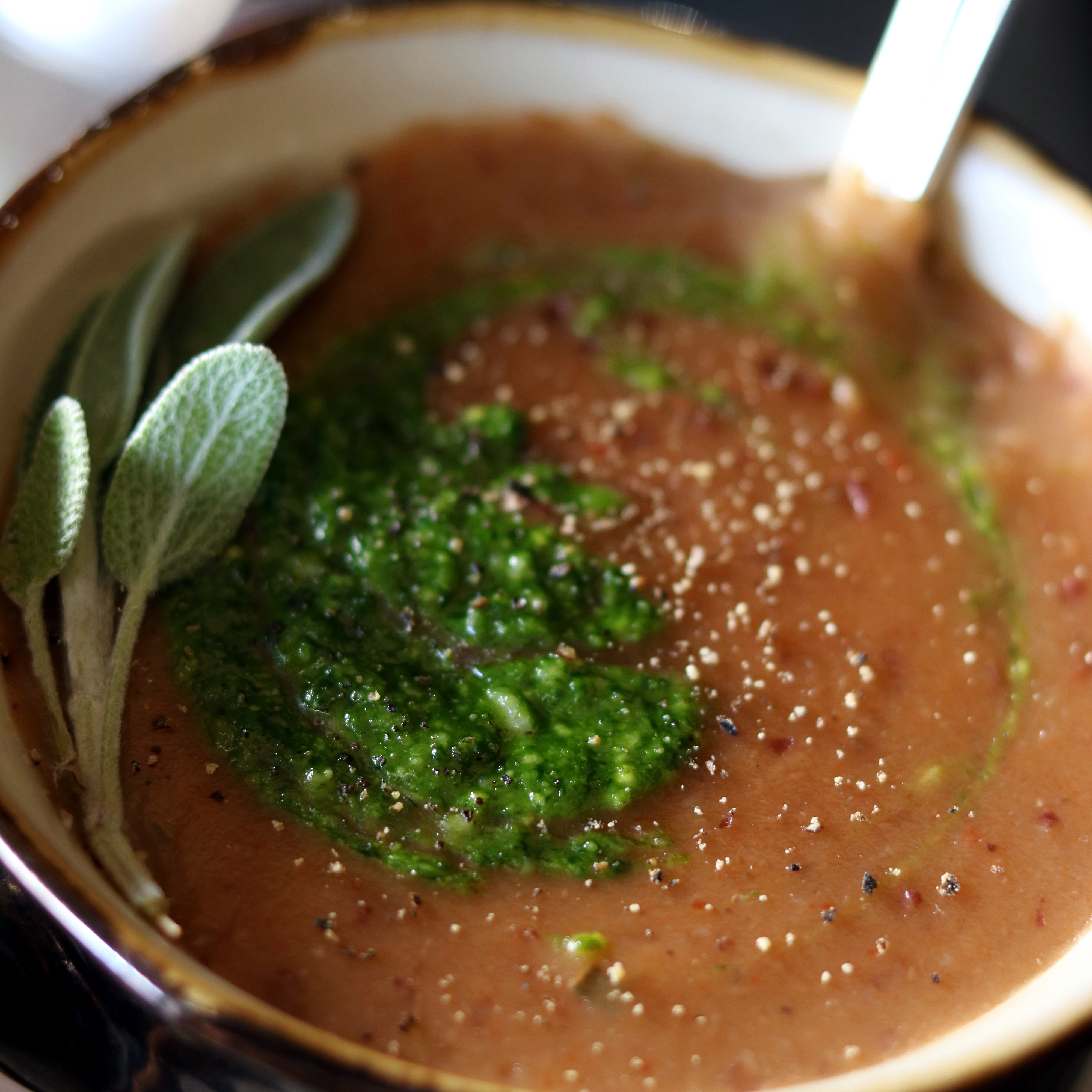 Creamy, comforting, warm creamy potato and cauliflower soup. Plus a recipe for arugula pesto! My families favorite topping!