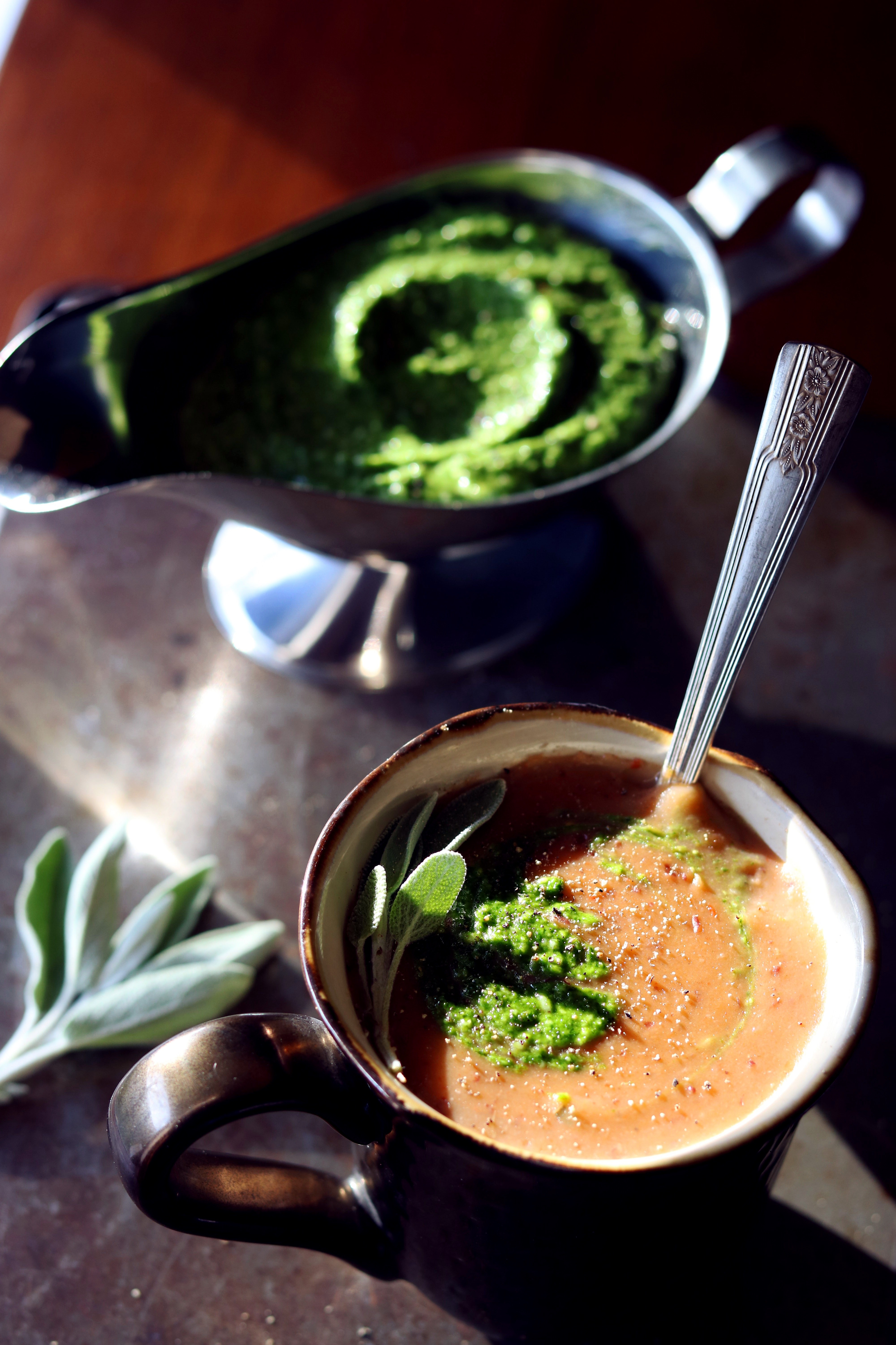 Creamy, comforting, warm creamy potato and cauliflower soup. Plus a recipe for arugula pesto! My families favorite topping!