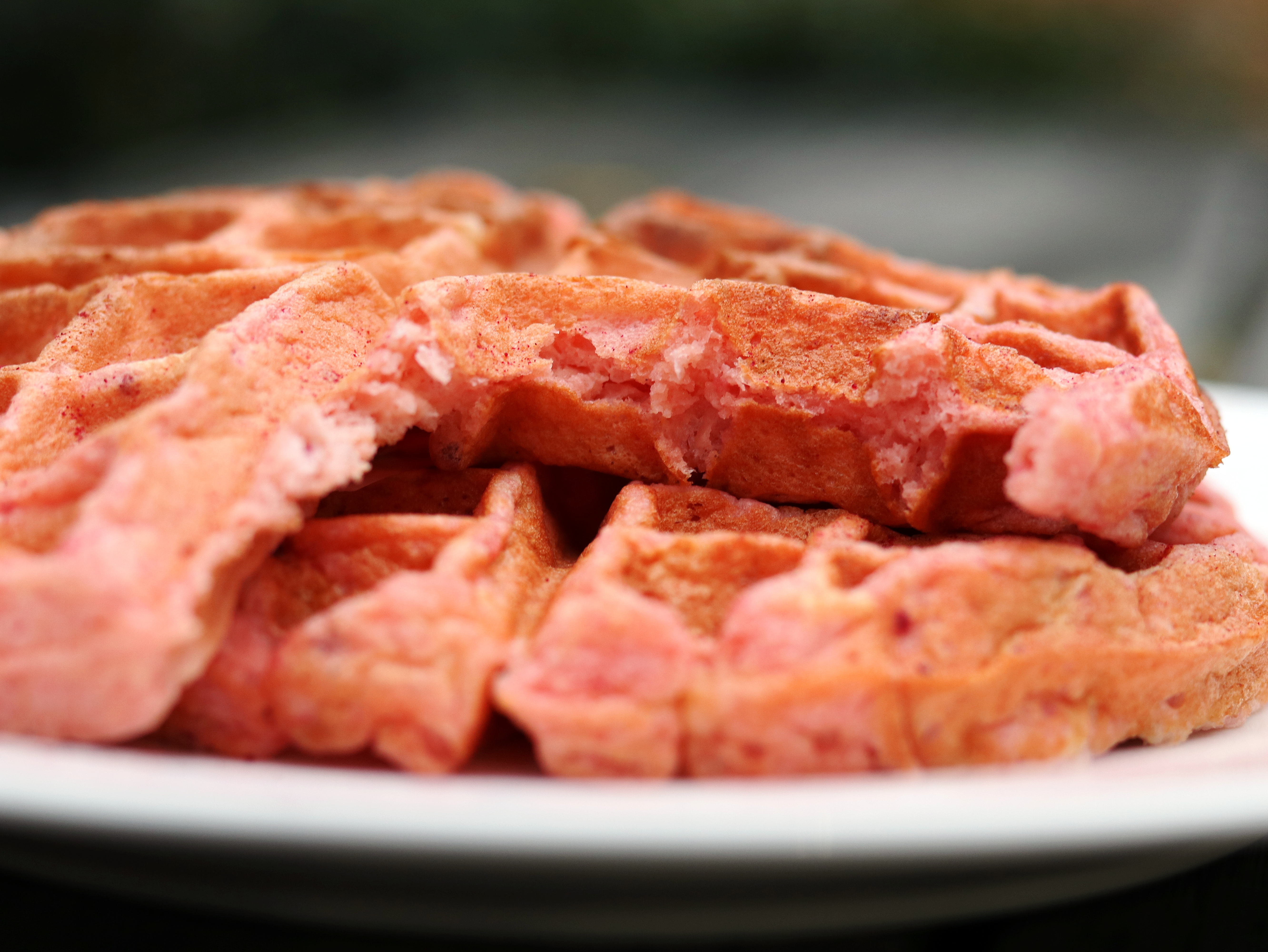 These pink rosemary and lemon Belgian waffles are the perfect way to say I love you for Valentine's day or for any time you are hosting brunch! They sound so gourmet and fancy, but they are a piece of cake (er waffle?) to make! The tart lemon curd and delicate woodiness of the rosemary will have your guests so impressed! And I have a little trick for you that will guarantee the fluffiest waffles time and time again. It takes hardly any extra time and will elevate your waffles from diner to gourmet. Valentine's Day Recipes | Lemon Curd | Belgian Waffle Recipes | Brunch Recipes